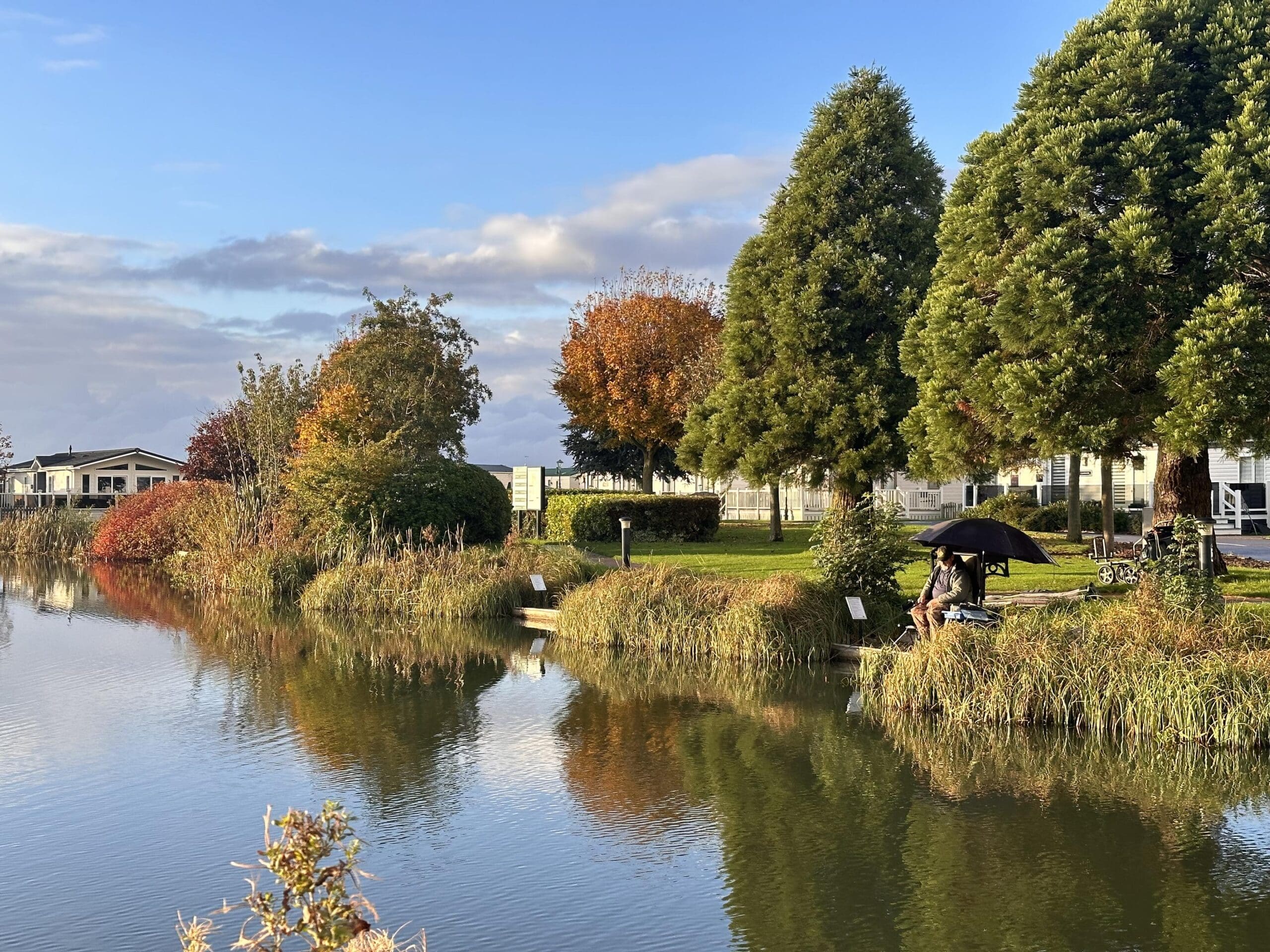 Fishing lake and countryside views at Patrington Haven Leisure Park in East Yorkshire.